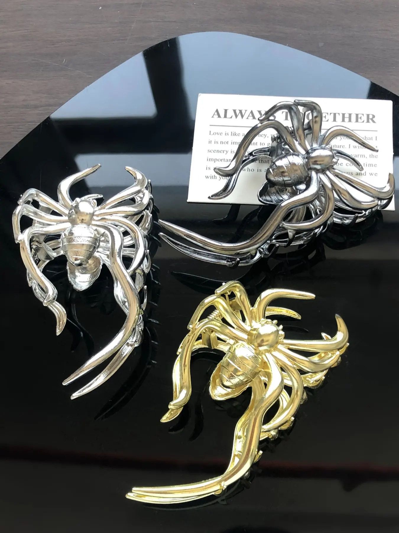Three-piece set of metal-colored spider-shaped Spooky horror-themed Halloween decorations for women, featuring a half-up hairstyle at the back of the head, perfect for festive parties