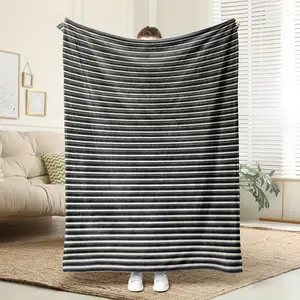A Cozy Black And White Striped Themed Flannel Blanket with Soft And High-Definition Digital Printing, Suitable for Year-Round Use As a Cooling Blanket. It'S a Perfect Gift for Family And Friends, Appropriate for All Seasons