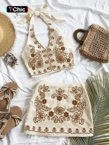 2 Piece Floral Embroidered Halter Top and Mini Skirt Set for Women, Bohemian Figure Flattering Matching Outfit for Beach Vacation Daily Wear Going Out Party Music Festival