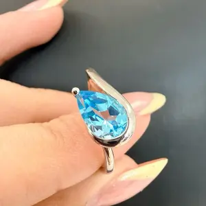 Ring with blue topaz