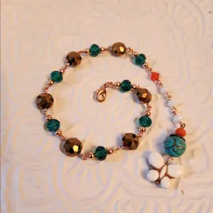 Lovely dark turquoise, orange, and white beaded bracelet/anklet