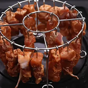 This modern vertical skewer holder with 24 stainless steel sticks works with 3QT–6QT air fryers, ovens and mini grills. It delivers uniform heat, reduces burning, ideal for kebabs, vegetables and hot dogs, useful kitchen accessory.