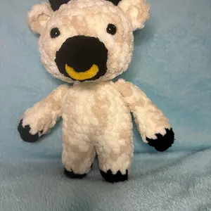 Handmade crochet cow amigurumi plush with nose ring