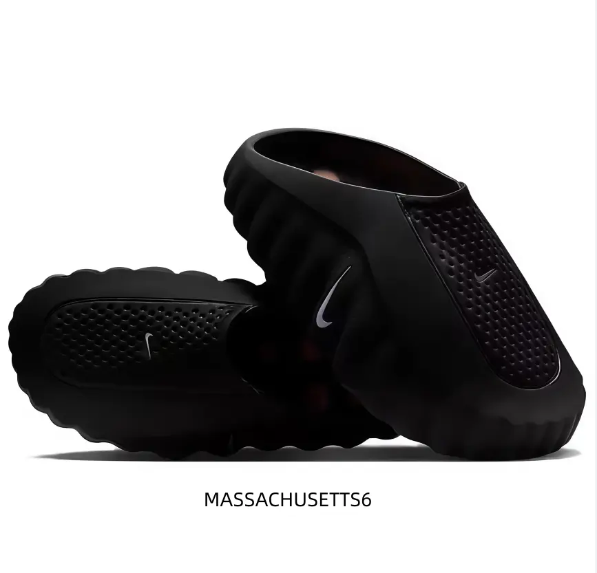 Futuristic Black Slide Sandals with Textured Sensory Nodes and Minimalist Swoosh Detail for Pre-Game Focus
