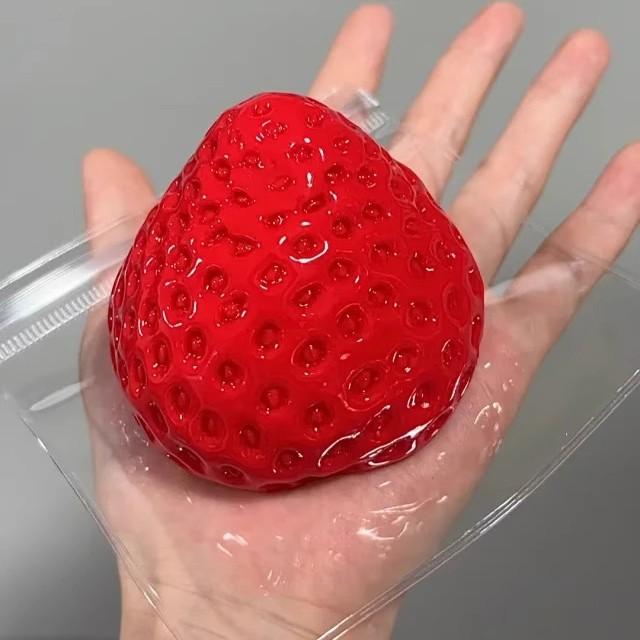 2-Pack adorable strawberry-shaped slow-rising squeeze ball; new strawberry squeeze toy; realistic strawberry-shaped stress relief ball—soft to the touch and effectively relieves stress; slow-rising stress relief toy with a moist, tactile texture.