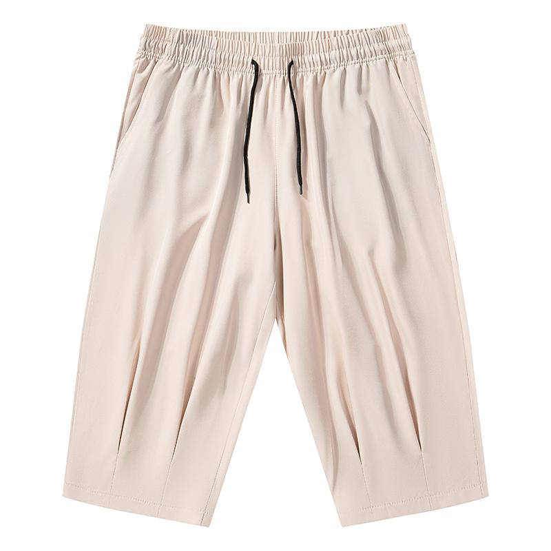 Men’s casual three-quarter pants made from solid-color fabric, available in multiple colors. Loose and comfortable, American retro and Japanese-style design with an elastic waistband and drawstring. Suitable for spring and summer outfits—a versatile, fash