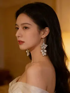 Exquisite metallic maple leaf shape with layered pearl tassels, creating a gentle and romantic vibe. The dangle design sways elegantly, adding a touch of sophistication to your daily look.