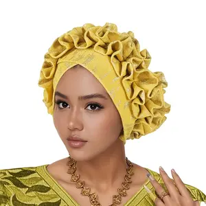 A Classic African Muslim Cap in a Single Color, Crafted from Ant Cloth And Adorned with Golden Flowers. It Boasts a Lightweight, Non-Stretchable, And Well-Fitted Design, Perfect for Everyday Use, Weddings, Tea Gatherings, And Gifts for Mother'S Day