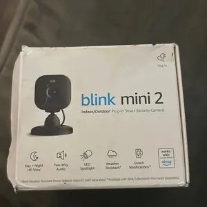 blink mini 2 indoor/outdoor plug-in, smart security camera, black new inbox