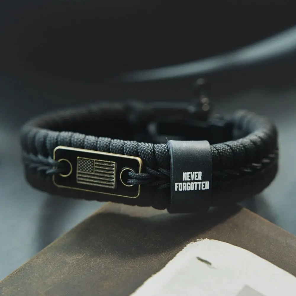 Never Forgotten Black Paracord Bracelet: Helps Pair Veterans With A Service Dog Or Shelter Dog Never Forgotten Black Paracord Bracelet: Helps Pair Veterans With A Service Dog Or Shelter Dog