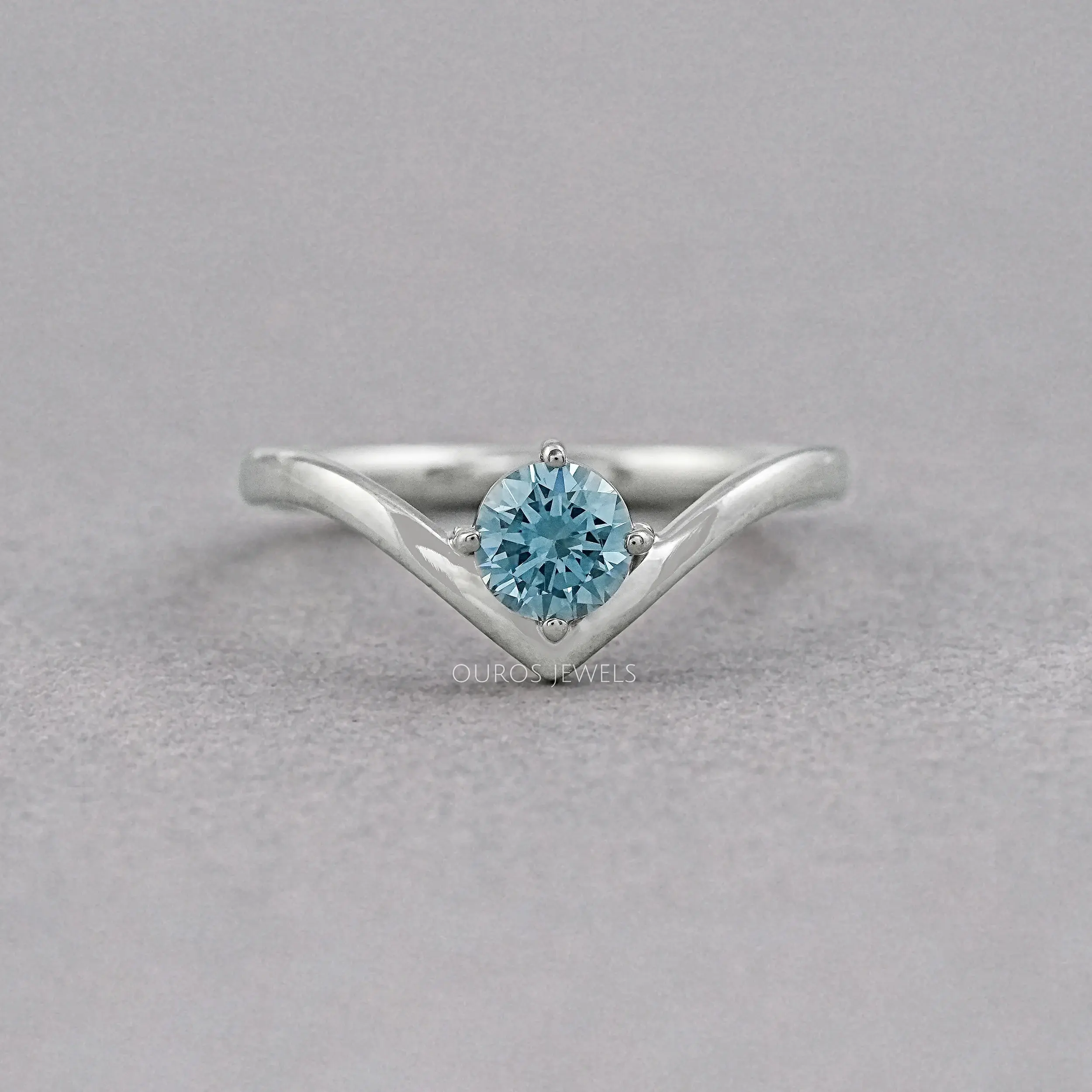 Blue Round Lab Diamond Curved Solitaire Ring