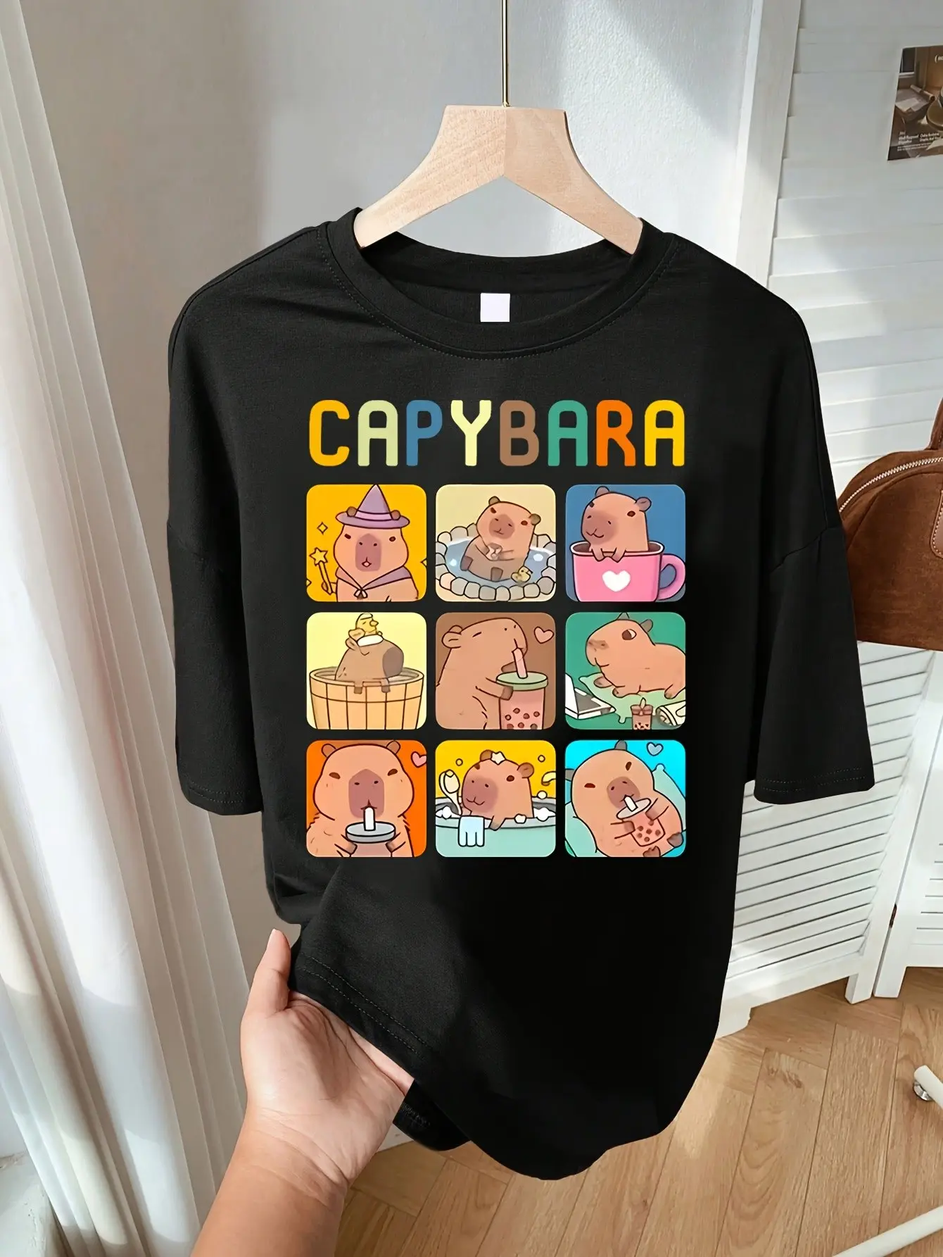 Capybara Graphic Tee | Soft Black TShirt for Girls | Breathable Loose Fit | Cute Back to School Top | Playful Animal Print | Vacation Ready Casual Crewneck Shortsleeve Cotton cute school tops