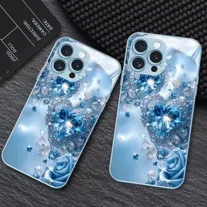 Fashion Blue Diamond Rose Heart Pattern New Metal Paint Tempered Glass Phone Case for iPhone 17/17 Air/17 Pro/17 Pro Max/16/16 Plus/16 Pro/16 Pro Max/15/15 Plus/15 Pro/15 Pro Max/14/14 Plus/14 Pro/14 Pro Max/13/13 Pro/13 Pro Max/12/12 Pro/12 Pro Max/11/11