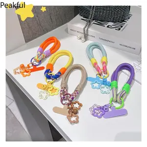 Dopamine Phone Lanyard | Viral Short Wrist Rope with Star & Bell Decor | Braided Anti-Lost Keychain Strap | Aesthetic Portable Wristband for All Phones, Ideal for Dating, Vacation, Shopping & Everyday Carry