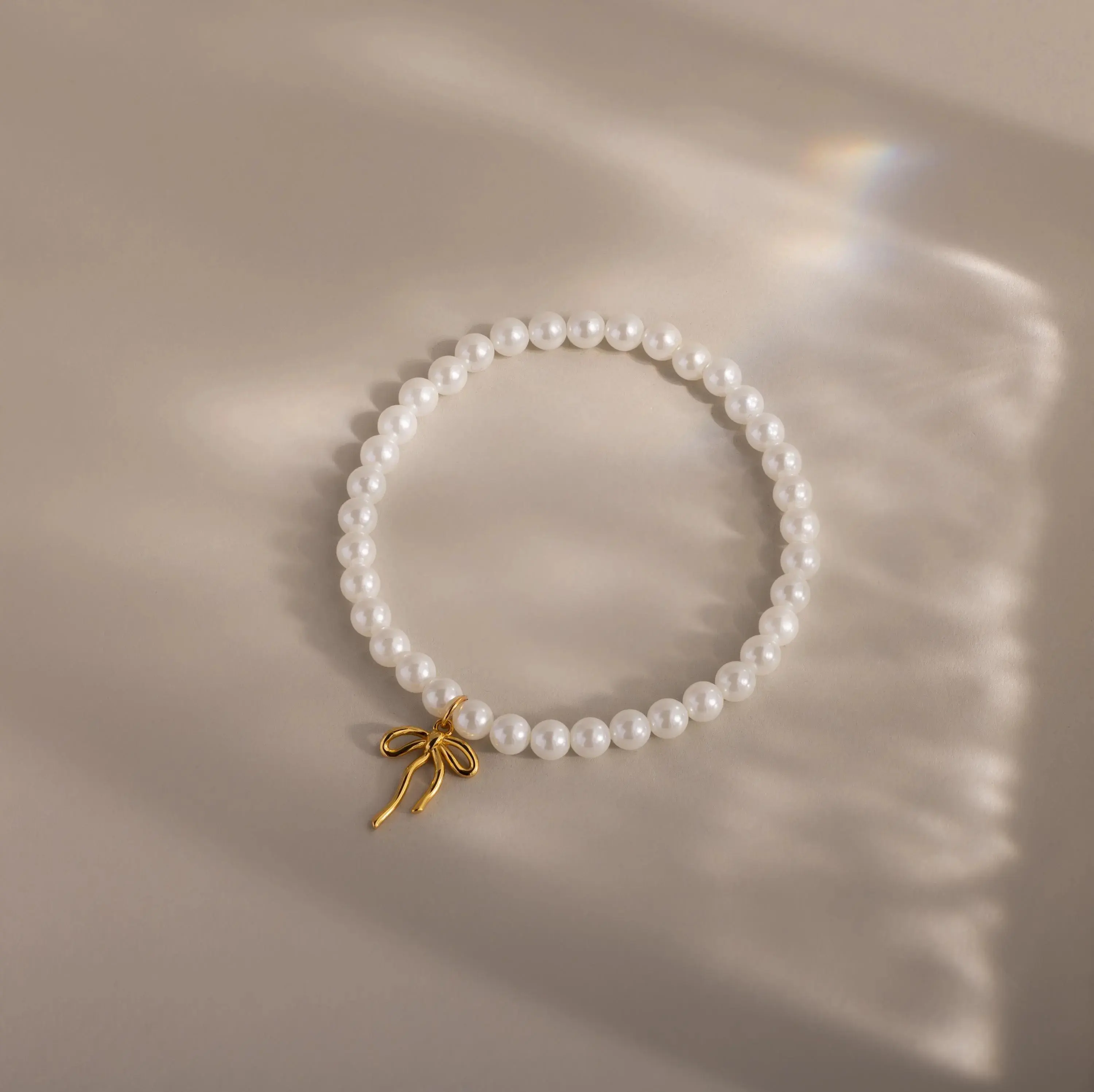 Bow Pearl Bracelet by Caitlyn Minimalist - Coquette Ribbon Charm Bracelet - Stackable Beaded Bracelet - Pearl Jewelry - Gift for Her