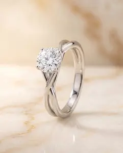 The Grace Twisted Hidden Halo Solitaire Engagement Ring Setting for Round Diamonds in Platinum