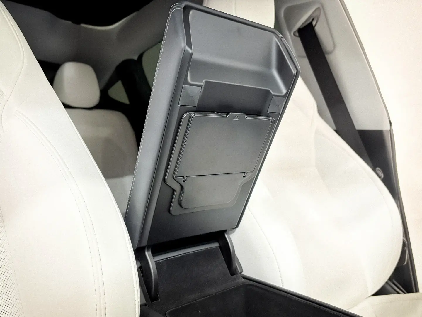 Tesla Model Y Armrest Hidden Storage Compartment