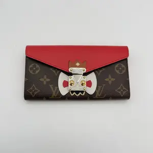 Pre-owned Louis Vuitton Small Goods Monogram Tribal Mask Sarah Wallet