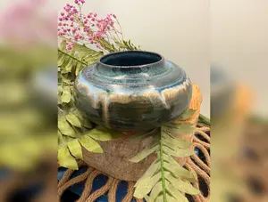 Handmade stoneware clay vase.