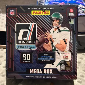 Donruss Football Mega Box - 2024 NFL Trading Cards Featuring Donruss Player in White and Green Jersey