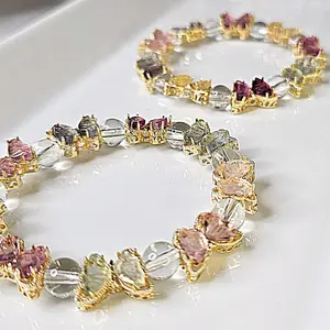 Flourite Butterfly Crystal Accessory with Floral Design, Includes Multiple Gemstones, Featuring Gold-Tone Finish