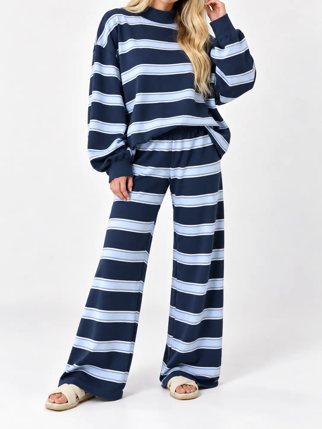 Women’s autumn/winter two-piece knit set with horizontal stripe print: half-high neck drop-shoulder loose long-sleeve sweatshirt and high-waisted, drapey wide-leg pants; relaxed casual loungewear and suitable for wearing out.