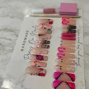 Handmade Press On Nails with Unique Designs and Pink Glitter Accent