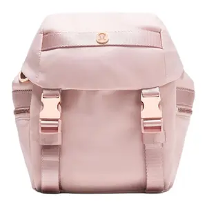 Lululemon Wunderlust 3L Mini Backpack with Silver Metal Logo and Buckle Closure for Women in Pink