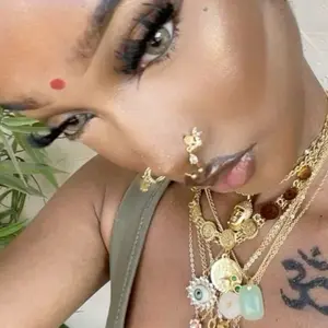 Statement Gold shop logo