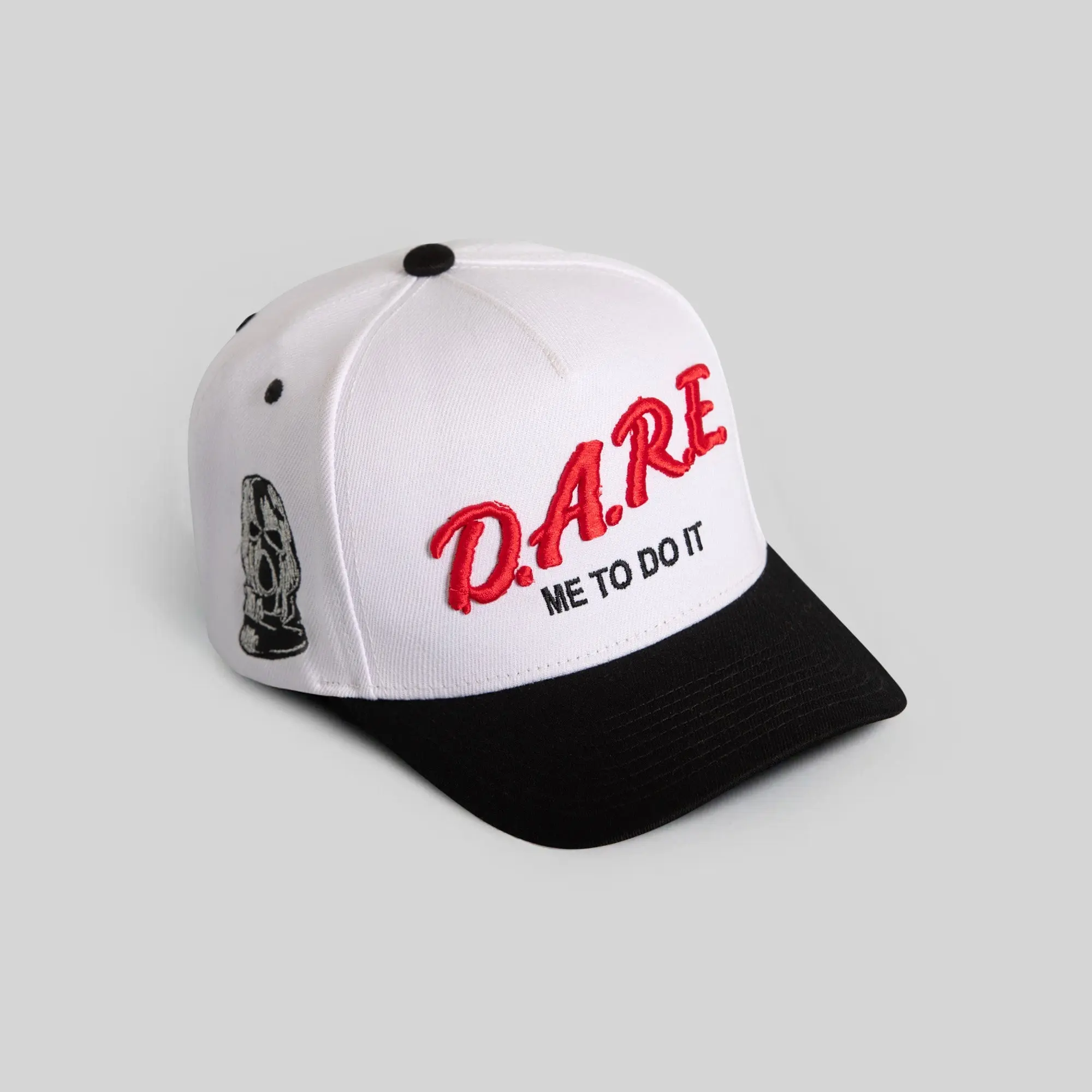 Field Grade Dare Me Trucker Hat White Black | trucker hat | snapback | adjustable | embroidered | casual | unisex | distressed | streetwear | dad hat | bold graphics | statement | Trendy Hat 2026 | Streetwear Headwear | Fashion Cap | Summer Hat | Sun Hat