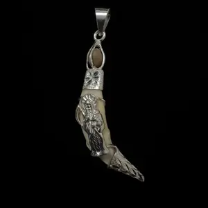 Tooth pendant with the image of the Holy Death made of 925 silver with real stone