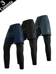 Men’s quick-dry, stretchy 2-in-1 athletic compression leggings—highly elastic, breathable, anti-chafing training pants; faux two-piece running/fitness/yoga compression long pants; blue shorts for layering over; black base layer leggings; moisture-wicking