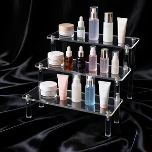 Multi-layer display stand for displaying perfume, large model display stand, and collectible storage rack. This multi-functional stand can be used for food display, perfume storage, and organizing small items. Cosmetic Shelf