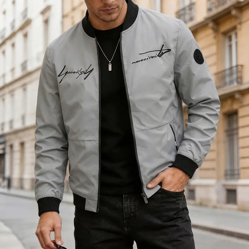 Men’s vintage graphic letter print bomber jacket, full zip casual coat with contrast ribbed trim and zippered pockets, retro American streetwear hip hop fashion outerwear for teen boys and men, suitable for everyday wear and travel