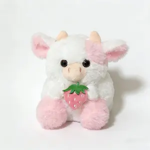 A pink plush cow doll with strawberry fur, featuring a soft filling of a cow holding a cute strawberry, Kawaii Stuffed Animals, perfect as a holiday gift for Valentine's Day