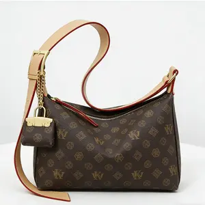 Vintage Hobo Bag with Monogram - Women's Shoulder Bag with Mini Padlock Pendant - Retro Brown Crossbody Bag for Daily Use