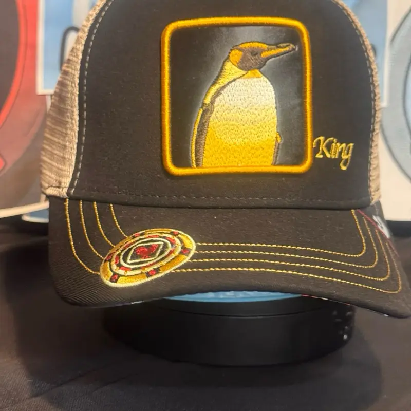 King Penguin Red & Beige Trucker Cap with Embroidered Penguin Design and Distinctive Stitching