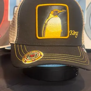 King Penguin Red & Beige Trucker Cap with Embroidered Penguin Design and Distinctive Stitching