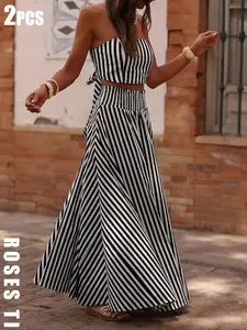 Elegant and casual Style 2026 spring/summer women's two-piece set with camisole straps, sleeveless striped top, ruffle edge mid length skirt, beach vacation Womenswear