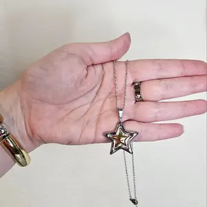 ASTRA – Collar estrella bicolor de acero inoxidable / ASTRA – Two-tone stainless steel star necklace