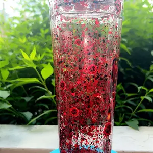 Black and red glitter motion cup