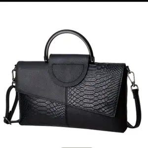 Black Small Bag with Crotch Pocket, Adjustable Strap, and Durable Leather Material