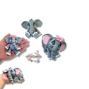 Miniature Elephant Articulating Figurine with Pink Bow and Detailed Features for Collectors