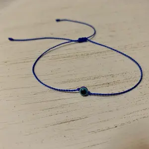 Thin and Minimalist Blue Evil Eye Bracelet - Adjustable String Design for Everyday Wear