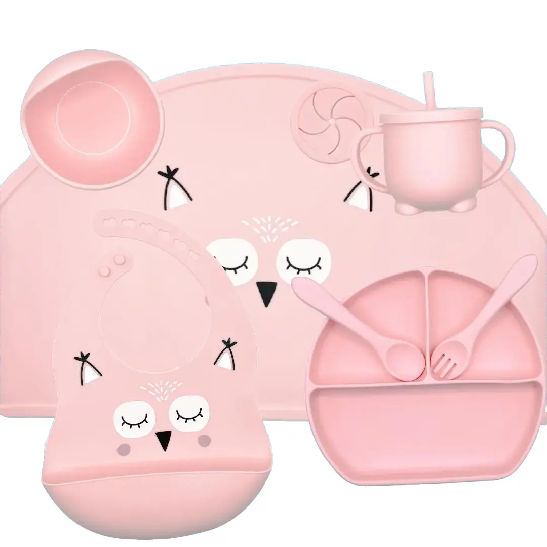 Tableware set 8-piece silicone that includes placemat, plate, bowl, spoon, fork, bib, cup with absorbent and lid.