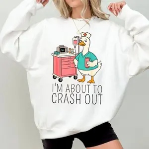 [Made in USA] I’m About To Crash Out Sweatshirt, Funny Goose Nurse Graphic Crewneck Pullover, Nurse Life Healthcare Humor Sweatshirt, Cute Nursing Student Crewneck, Trendy Nurse Gift For Women