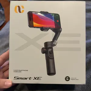 Product Review of Handheld 3 Axis Anti-shake Shooting Stand (1 Count), Rotating Automatic Face Tracking Tripod Stabilizer for Live Video, Phone Accessories, Content Creator Tools from T**a D**s