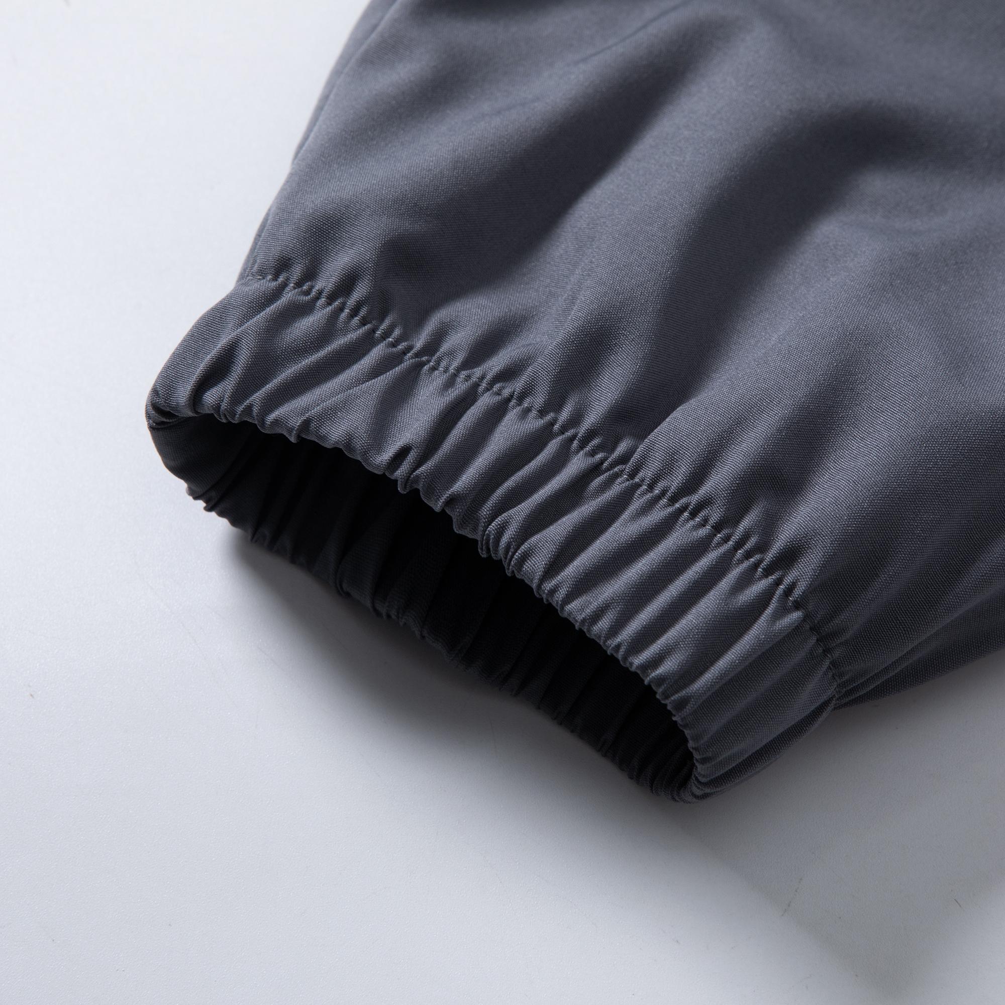 Men’s lightweight jogger pants with stretch fabric, 95% polyester, 5% spandex; elastic waistband with zippered pockets; breathable, quick-drying casual bottoms; men’s sports-casual jogger pants; machine washable.