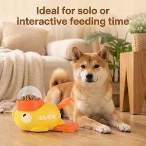 An interactive automatic feeder shaped like a yellow duck, equipped with three different-sized caps, designed to provide pets with a fun and precisely portioned feeding experience.