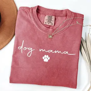 Comfort Colors Dog Mama Paw T-Shirt, a perfect Mother’s Day gift for proud dog moms, dog lovers, dog grandmas, and devoted pet parents everywhere.